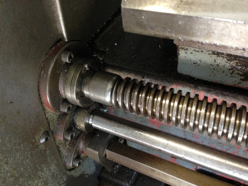 The lead screw of a lathe with nut forms a