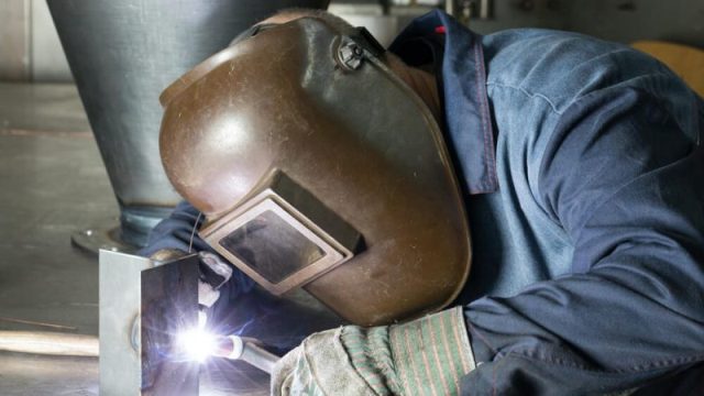 What device is used to protect face from UV and Infra-red radiation during welding?