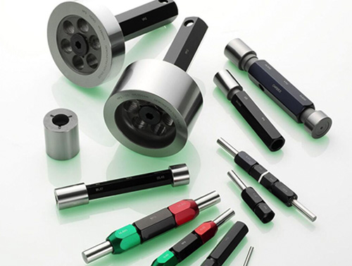 Which among the following instruments are used to check the components only to ensure that the sizes are within the prescribed limits in mass production work